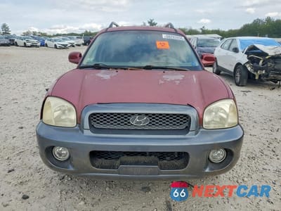 Piąte zdjęcie samochodu w środku: 2004 HYUNDAI SANTA FE GLS VIN:KM8SC13E04U745306 - miniatura