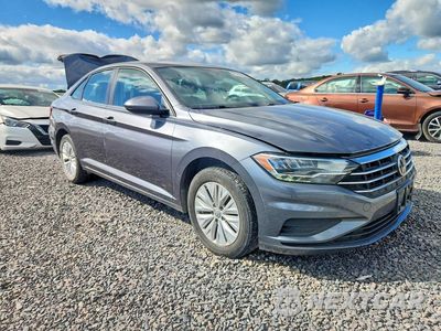 Czwarte zdjęcie samochodu z boku: 2019 VOLKSWAGEN JETTA S VIN:3VWC57BU9KM139984 - miniatura