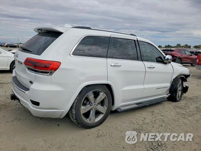 Trzecie zdjęcie samochodu z tyłu: 2014 JEEP GRAND CHEROKEE OVERLAND VIN:1C4RJFCT6EC417545 - miniatura