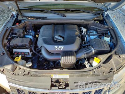 Zdjęcie 12 z 13 samochodu: 2013 JEEP GRAND CHEROKEE OVERLAND VIN:1C4RJECG4DC612796 - miniatura