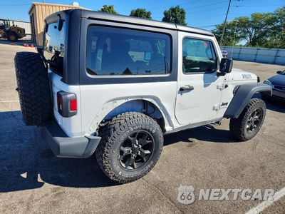 Trzecie zdjęcie samochodu z tyłu: 2023 JEEP WRANGLER SPORT VIN:1C4GJXANXPW636270 - miniatura