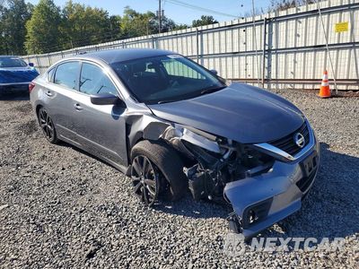 Czwarte zdjęcie samochodu z boku: 2018 NISSAN ALTIMA 2.5 SR VIN:1N4AL3AP7JC222761 - miniatura