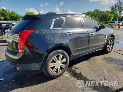 Trzecie zdjęcie samochodu z tyłu: 2012 CADILLAC SRX LUXURY COLLECTION VIN:3GYFNAE36CS512096 - miniatura