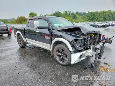 Czwarte zdjęcie samochodu z boku: 2014 RAM 1500 LARAMIE VIN:1C6RR7NT3ES231177 - miniatura
