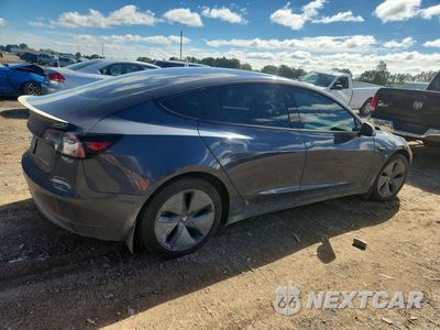 Trzecie zdjęcie samochodu z tyłu: 2019 TESLA MODEL 3 VIN:5YJ3E1EB0KF510349 - miniatura