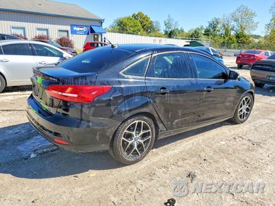 Trzecie zdjęcie samochodu z tyłu: 2017 FORD FOCUS SEL VIN:1FADP3H29HL302858 - miniatura