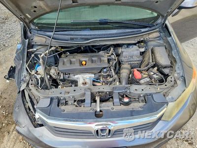 Zdjęcie 11 z 12 samochodu: 2012 HONDA CIVIC LX VIN:2HGFB2F51CH312753 - miniatura