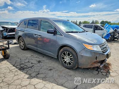 Czwarte zdjęcie samochodu z boku: 2011 HONDA ODYSSSEY VIN:5FNRL5H6XBB001679 - miniatura