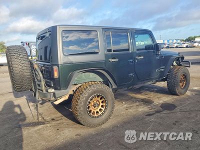 Trzecie zdjęcie samochodu z tyłu: 2012 JEEP WRANGLER UNLIMITED SPORT VIN:1C4HJWDGXCL182223 - miniatura