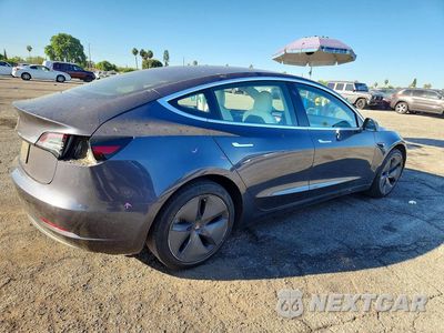 Trzecie zdjęcie samochodu z tyłu: 2020 TESLA MODEL 3 VIN:5YJ3E1EA2LF738118 - miniatura