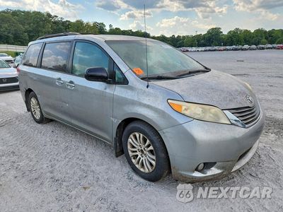 Czwarte zdjęcie samochodu z boku: 2012 TOYOTA SIENNA XLE 8-PASSENGER VIN:5TDYK3DC4CS219841 - miniatura