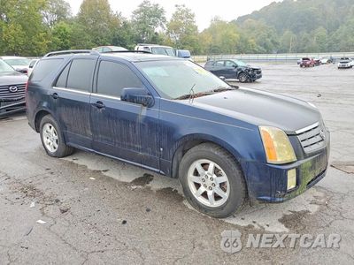 Czwarte zdjęcie samochodu z boku: 2006 CADILLAC SRX VIN:1GYEE637060134173 - miniatura