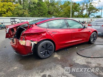 Trzecie zdjęcie samochodu z tyłu: 2024 TESLA MODEL 3 VIN:5YJ3E1EB9RF796017 - miniatura