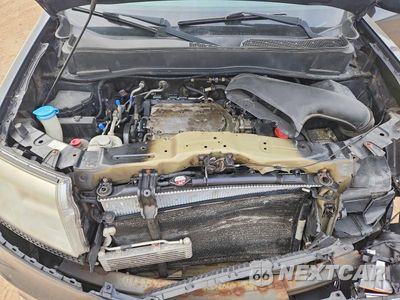 Zdjęcie 12 z 14 samochodu: 2013 HONDA PILOT TOURING VIN:5FNYF4H94DB035448 - miniatura