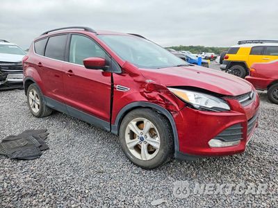 Czwarte zdjęcie samochodu z boku: 2016 FORD ESCAPE SE VIN:1FMCU9GX7GUB54339 - miniatura