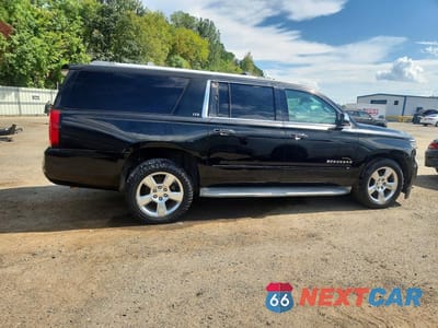 Trzecie zdjęcie samochodu z tyłu: 2015 CHEVROLET SUBURBAN C1500 LTZ VIN:1GNSCKKC9FR263117 - miniatura
