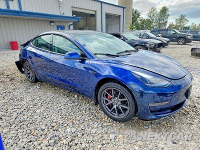 Czwarte zdjęcie samochodu z boku: 2021 TESLA MODEL 3 VIN:5YJ3E1EB2MF983317 - miniatura