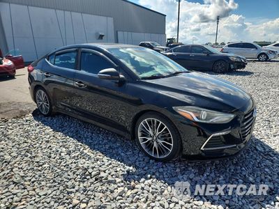 Czwarte zdjęcie samochodu z boku: 2018 HYUNDAI ELANTRA SPORT VIN:KMHD04LBXJU508133 - miniatura