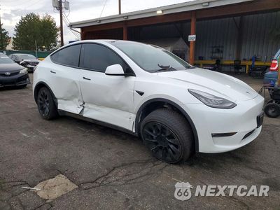 Czwarte zdjęcie samochodu z boku: 2021 TESLA MODEL Y VIN:5YJYGDEE6MF300112 - miniatura