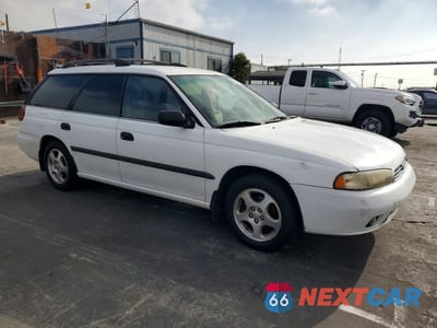 Czwarte zdjęcie samochodu z boku: 1995 SUBARU LEGACY L VIN:4S3BK6354S7343014 - miniatura