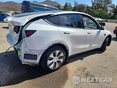 Trzecie zdjęcie samochodu z tyłu: 2023 TESLA MODEL Y VIN:7SAYGDEE9PA107604 - miniatura