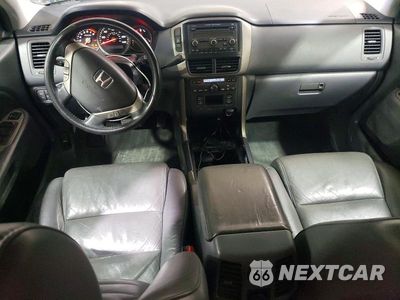 Zdjęcie 8 z 14 samochodu: 2007 HONDA PILOT EXL VIN:2HKYF185X7H537088 - miniatura