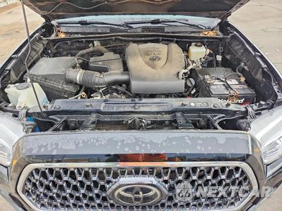 Zdjęcie 11 z 12 samochodu: 2018 TOYOTA TACOMA TRD OFF-ROAD VIN:5TFCZ5AN3JX139090 - miniatura