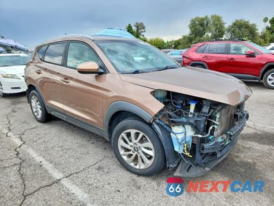 Czwarte zdjęcie samochodu z boku: 2016 HYUNDAI TUCSON SE VIN:KM8J33A42GU186895 - miniatura