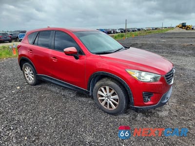 Czwarte zdjęcie samochodu z boku: 2016 MAZDA CX-5 TOURING VIN:JM3KE2CY0G0742696 - miniatura