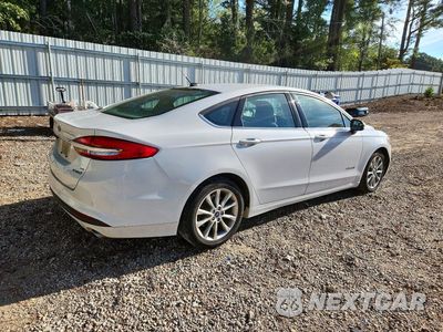Trzecie zdjęcie samochodu z tyłu: 2017 FORD FUSION SE HYBRID VIN:3FA6P0LU6HR110959 - miniatura
