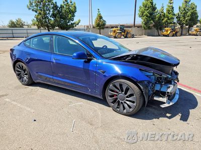 Czwarte zdjęcie samochodu z boku: 2022 TESLA MODEL 3 VIN:5YJ3E1EC3NF358483 - miniatura