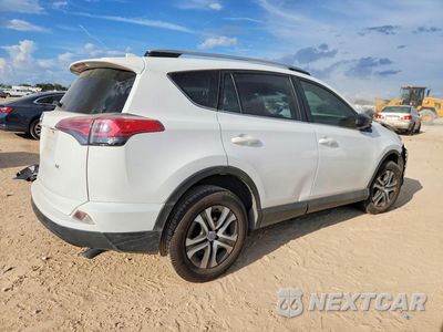 Trzecie zdjęcie samochodu z tyłu: 2018 TOYOTA RAV4 LE VIN:JTMZFREV5JJ210278 - miniatura