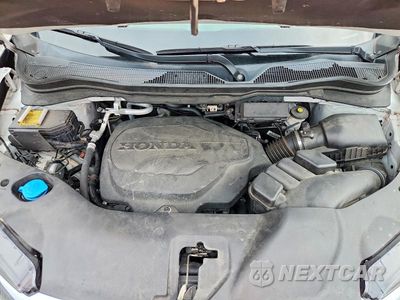 Zdjęcie 12 z 13 samochodu: 2022 HONDA PILOT TOURING VIN:5FNYF6H61NB045566 - miniatura