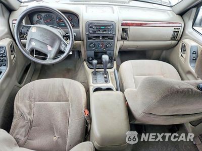 Zdjęcie 8 z 12 samochodu: 2000 JEEP GRAND CHEROKEE LAREDO VIN:1J4GW48S7YC419025 - miniatura