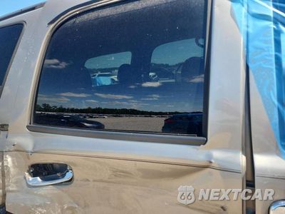 Zdjęcie 11 z 12 samochodu: 2002 CHEVROLET TAHOE C1500 VIN:1GNEC13V52R315327 - miniatura