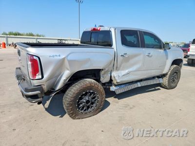 Trzecie zdjęcie samochodu z tyłu: 2016 GMC CANYON SLT VIN:1GTP6DE1XG1370835 - miniatura