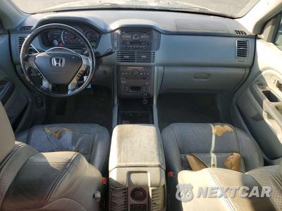 Zdjęcie 8 z 13 samochodu: 2004 HONDA PILOT EXL VIN:2HKYF18634H555789 - miniatura