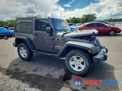 Czwarte zdjęcie samochodu z boku: 2018 JEEP WRANGLER SPORT VIN:1C4AJWAG8JL894894 - miniatura