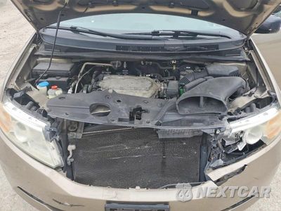 Zdjęcie 12 z 14 samochodu: 2012 HONDA ODYSSEY EXL VIN:5FNRL5H64CB057330 - miniatura