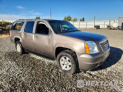 Czwarte zdjęcie samochodu z boku: 2014 GMC YUKON XL K1500 SLT VIN:1GKS2KE70ER129562 - miniatura