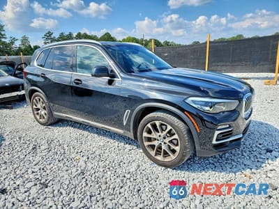 Czwarte zdjęcie samochodu z boku: 2021 BMW X5 SDRIVE 40I VIN:5UXCR4C01M9E29351 - miniatura