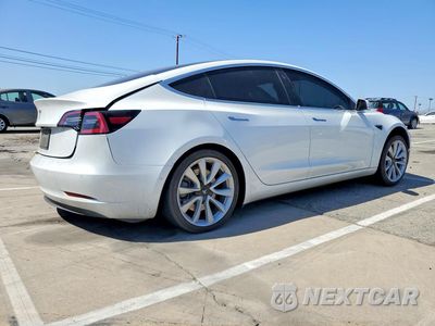 Trzecie zdjęcie samochodu z tyłu: 2019 TESLA MODEL 3 VIN:5YJ3E1EA5KF476657 - miniatura