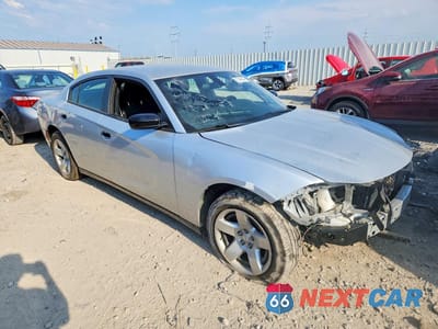 Czwarte zdjęcie samochodu z boku: 2021 DODGE CHARGER POLICE VIN:2C3CDXAT1MH664039 - miniatura