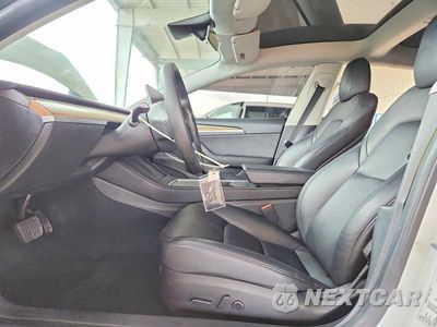 Zdjęcie 7 z 13 samochodu: 2021 TESLA MODEL 3 VIN:5YJ3E1EA4MF092095 - miniatura