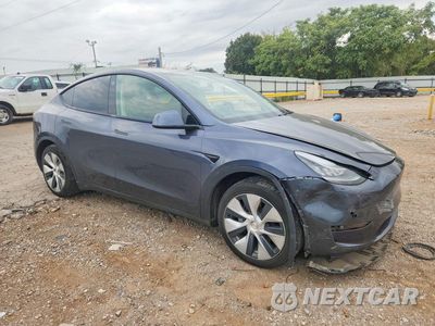 Czwarte zdjęcie samochodu z boku: 2021 TESLA MODEL Y VIN:5YJYGDEE0MF124772 - miniatura