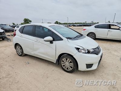 Czwarte zdjęcie samochodu z boku: 2015 HONDA FIT VIN:3HGGK5H59FM722922 - miniatura