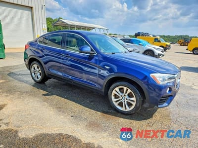 Czwarte zdjęcie samochodu z boku: 2015 BMW X4 XDRIVE28I VIN:5UXXW3C58F0M89017 - miniatura
