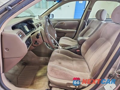 Zdjęcie 7 z 12 samochodu: 1999 TOYOTA CAMRY LE VIN:JT2BG22K0X0373427 - miniatura