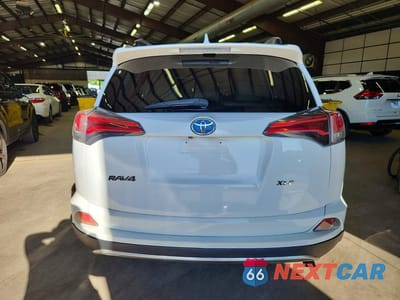 Zdjęcie 6 z 13 samochodu: 2018 TOYOTA RAV4 HYBRID XLE VIN:JTMRJREV2JD157505 - miniatura