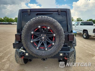 Zdjęcie 6 z 13 samochodu: 2015 JEEP WRANGLER UNLIMITED SAHARA VIN:1C4BJWEG9FL648605 - miniatura